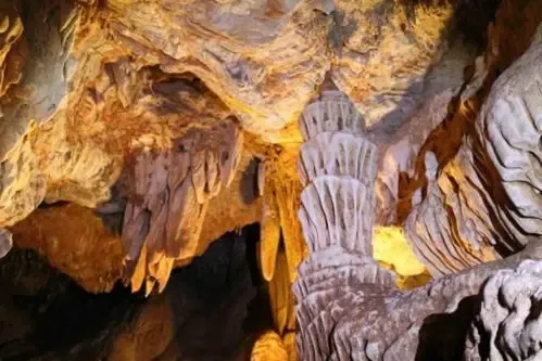 Walkways and limestone formations inside a dry cave in Bonito, MS